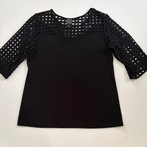 CLARA SUNWOO Black Tunic with mesh laser cut-out detail.